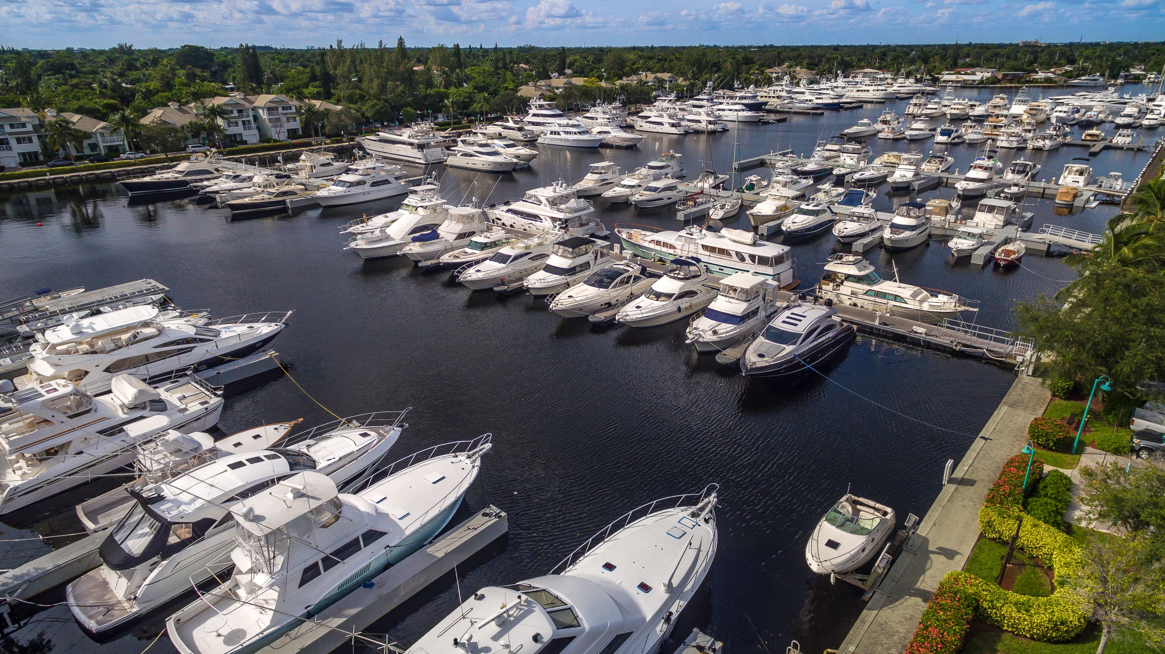 Aerial view of yachts berthed throughout the Marina Bay basin
